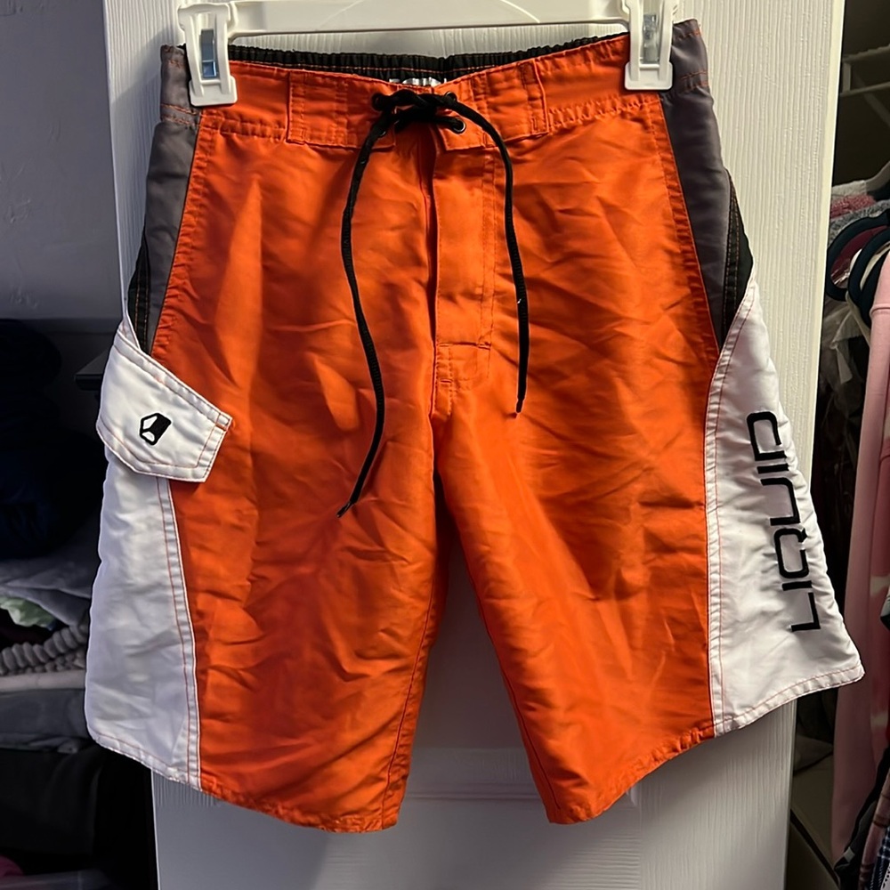 Liquid Orange Swim Trunks